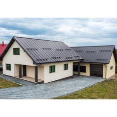 Modern családi ház matt fekete Bilka Retro Panel Flat tetőfedéssel.